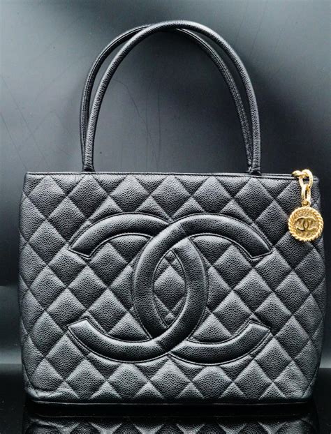 chanel medallion black quilted leather tote|Chanel medallion tote size.